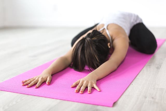 Back pain exercises can include Child's pose in Yoga